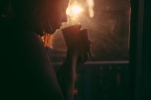 woman enjoying a cup of coffee